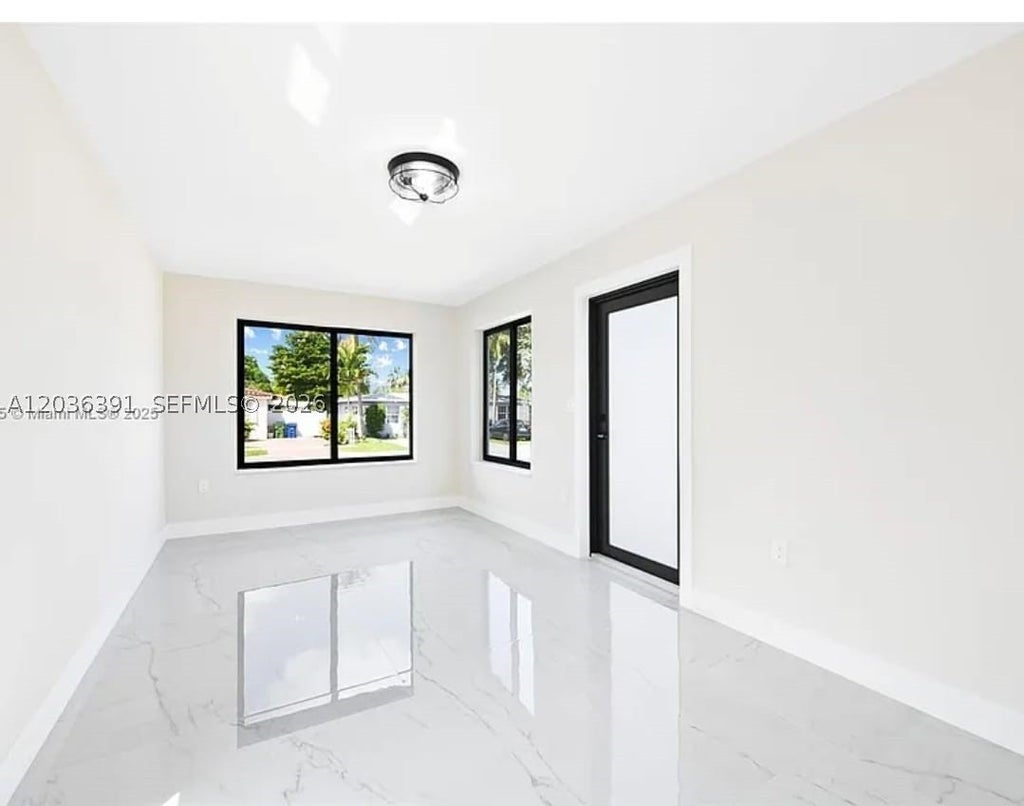 Photo of 721 SW 5th Ct #0, Hallandale Beach, FL 33009 (MLS # A12036391)