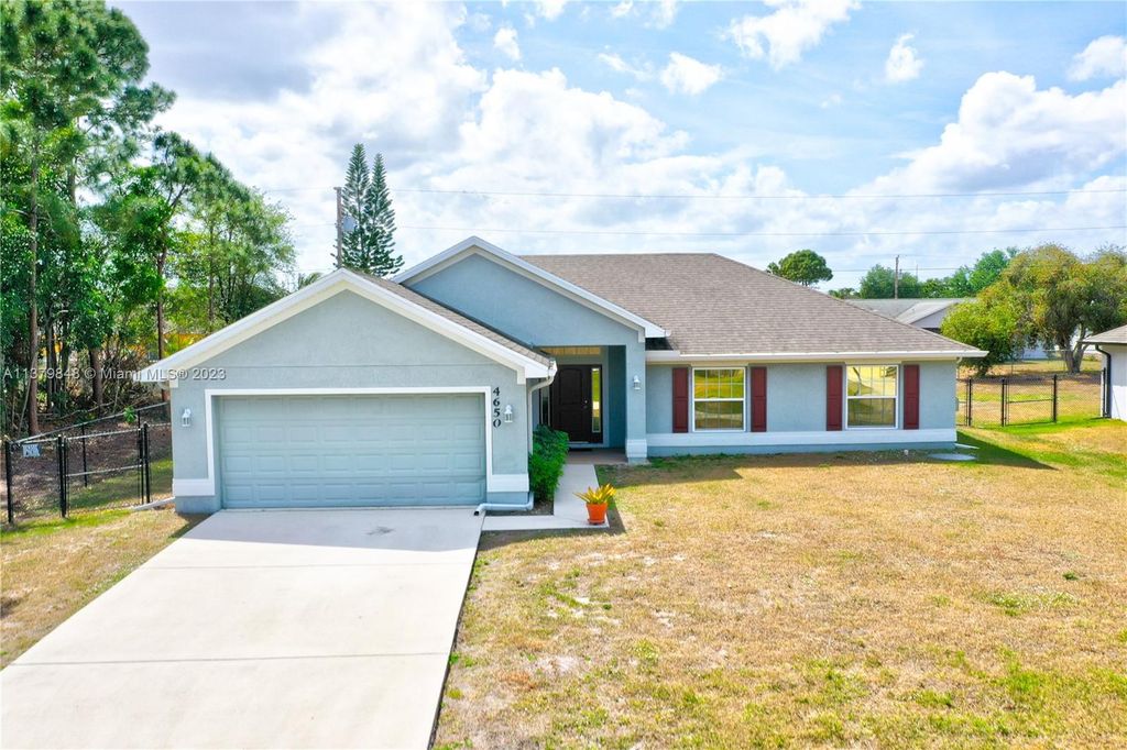 Photo of 4650 SW Cacao St, Port Saint Lucie, FL 34953 (MLS # A11379848)