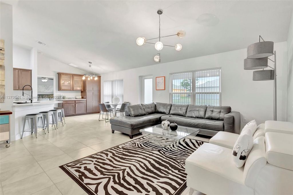 Photo of 4650 SW Cacao St, Port Saint Lucie, FL 34953 (MLS # A11379848)