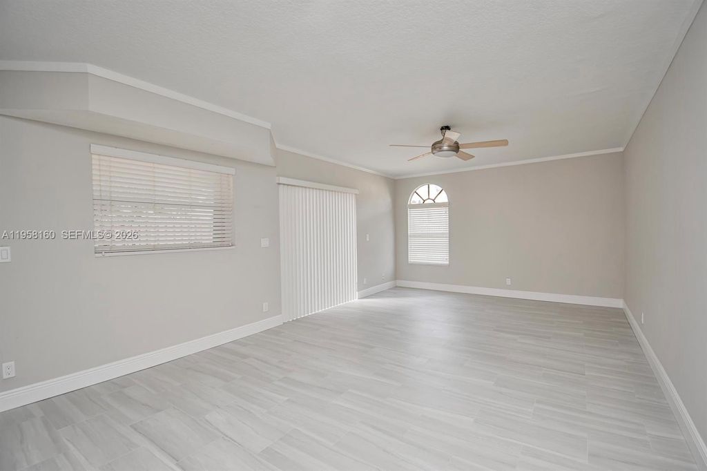 Photo of 4240 Village Dr #B, Delray Beach, FL 33445 (MLS # A11958160)