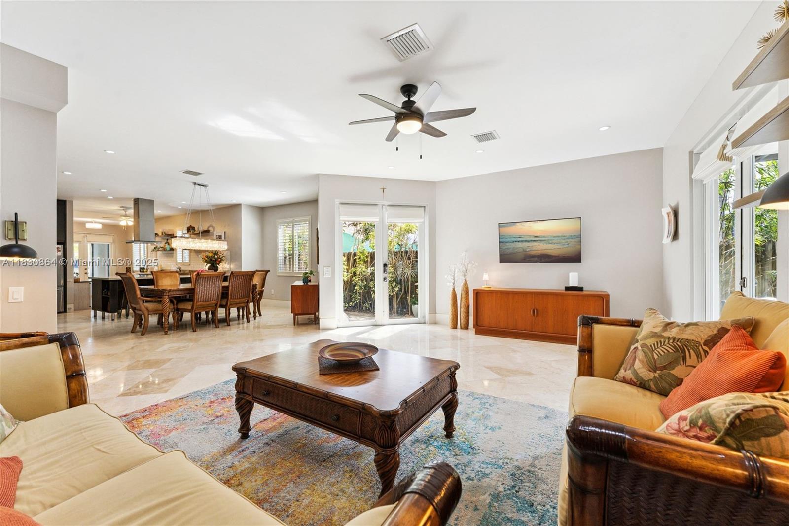 Beautifully upgraded Croissant Park townhome with 9’ ceilings—minutes to downtown, the beach, and FLL Airport. Private, low-maintenance yard with saltwater 5-seater Jacuzzi, artificial turf, and pergola with motorized screen. Oversized primary with expansive balcony, ensuite bath, walk-in closet, and nearby laundry. Open-concept main level features chef’s kitchen, stainless steel appliances, and bar-height counter for dining or cocktails. Converted garage adds flexible space for a gym, studio, or storage. Whole-house water filtration and air scrubber! Steps to a neighborhood playground, four blocks to Croissant Park, and minutes to the beach and SE 17th Street shopping & dining. Easy access to I-95, 595, and the Turnpike. No HOA and an unbeatable location—this one checks every box!