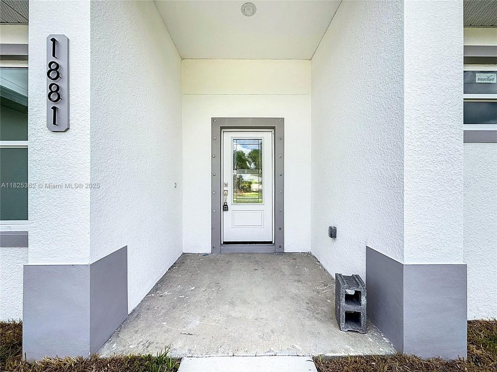 Photo of 1881 SW Davis St, Port St Lucie, FL 34953 (MLS # A11825362)
