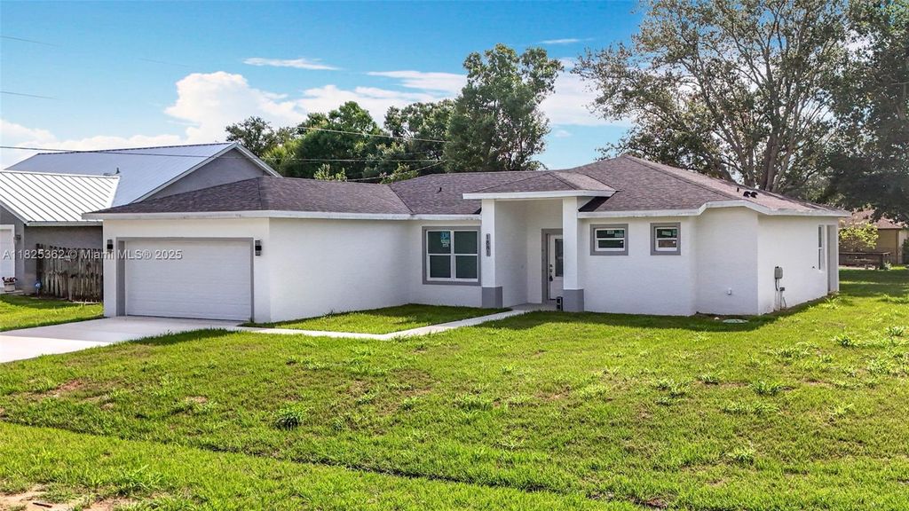 Photo of 1881 SW Davis St, Port St Lucie, FL 34953 (MLS # A11825362)