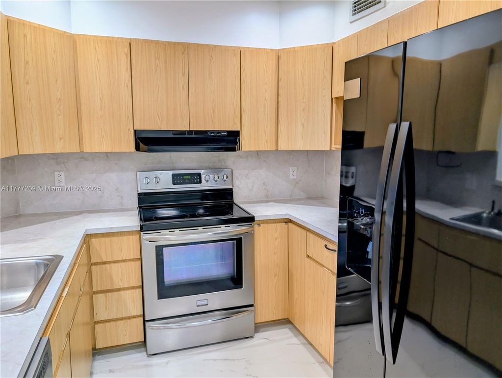 Photo of 200 Jacaranda Country Club Dr #6A, Plantation, FL 33324 (MLS # A11777209)