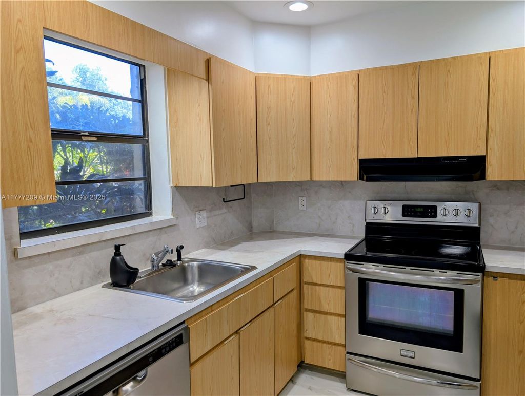 Photo of 200 Jacaranda Country Club Dr #6A, Plantation, FL 33324 (MLS # A11777209)