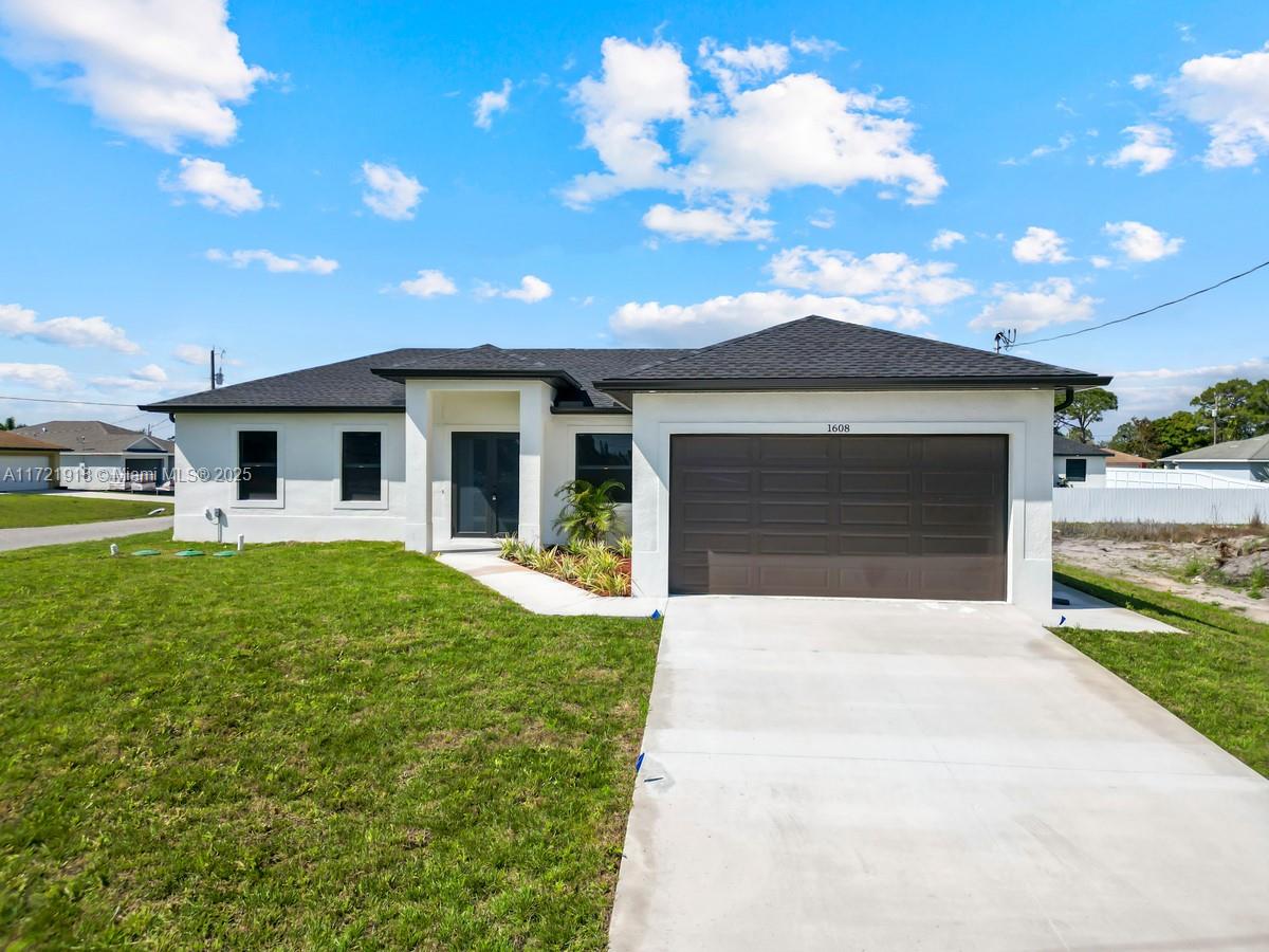 Property for Sale at 1608 Flora Ave S Ave, Lehigh Acres, Lee County, Florida - Bedrooms: 3 
Bathrooms: 2  - $335,000