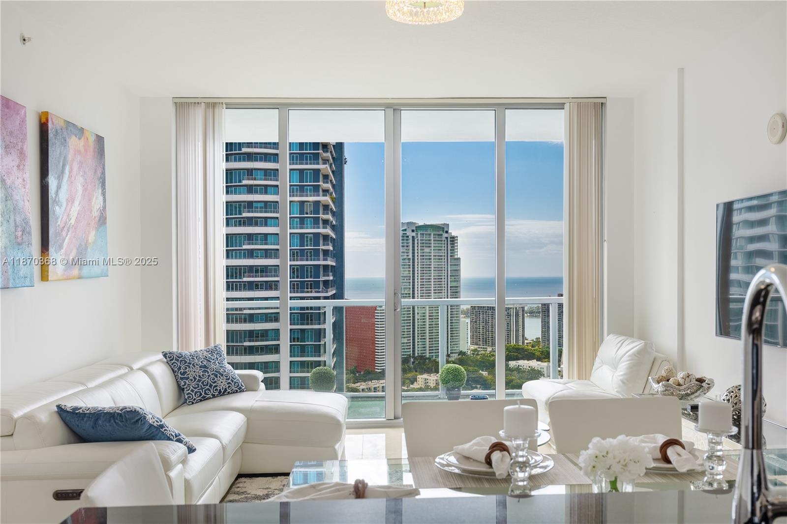 Absolutely Gorgeous, Fully Furnished and Equipped Turnkey 2 BEDROOM 2 BATH Unit at Axis on Brickell with Unobstructed South Facing Panoramic Water and City views. AVAILABE FOR OCCUPANCY 10/1/25. . TILED Floors throughout, Floor to ceiling glass that provide maximum natural light and private access to the balcony from the living room and both bedrooms. Over-sized balcony offering 180 degree unobstructed views. Located in the PRIME location of Brickell, surrounded by restaurants, shops of Mary Brickell Village, Brickell City Center. Luxurious amenities include two pools, BBQ area, jacuzzi, party room, playroom, steam room, business center, state-of-the-art gym, valet parking, concierge and security. Quick Condo Approval. Virtual video available upon request.