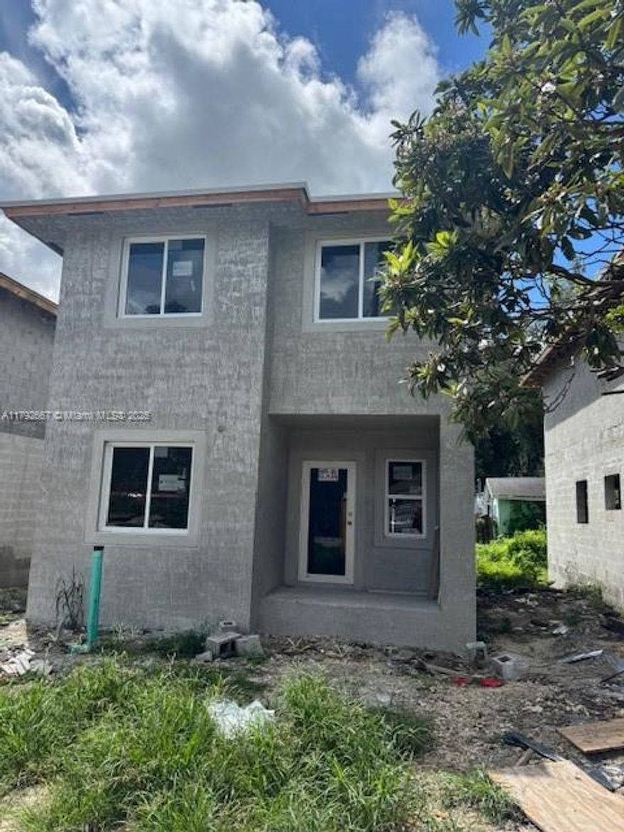 NEW CONSTRUCTION. 4 BEDROOM 3 BATH 2 STORY HOME. TO BE COMPLETED APPROX.  OCTOBER 2025. IMPACT WINDOWS & DOORS. KITCHEN WOOD CABINETS WITH GRANITE COUNTERTOPS, STAINLESS STEEL APPLIANCES AND TANKLESS WATER HEATER. ONE BEDROOM AND ONE BATH ON 1ST FLOOR. NO HOA. CENTRALLY LOCATED CLOSE TO MIA, SEAPORT AND DESIGN DISTRICT.