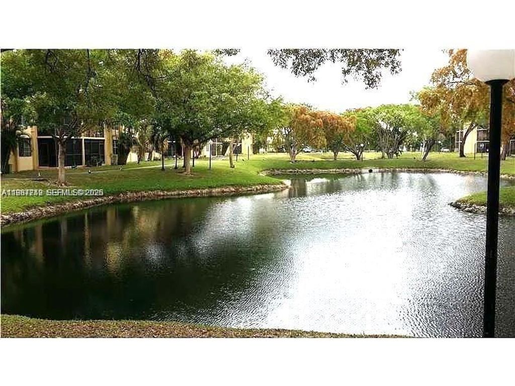 Photo of 3253 Foxcroft Rd #G107, Miramar, FL 33025 (MLS # A11987242)