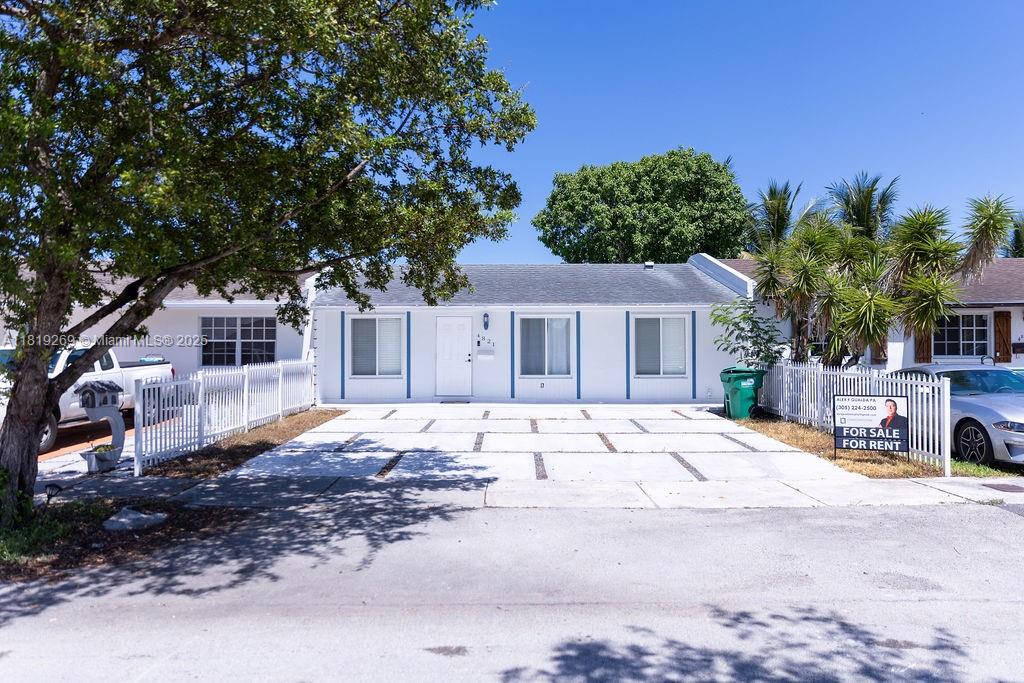Beautifully renovated waterfront home featuring a new roof, impact windows, new A/C, and Titan water heater. Enjoy upgraded tile flooring throughout, new walls, and a spacious master bedroom with walk-in closet and captivating lake views. The recently updated patio is perfect for entertaining. This 3-bedroom, 1-bath residence offers stylish modern comfort in a prime lakefront setting.