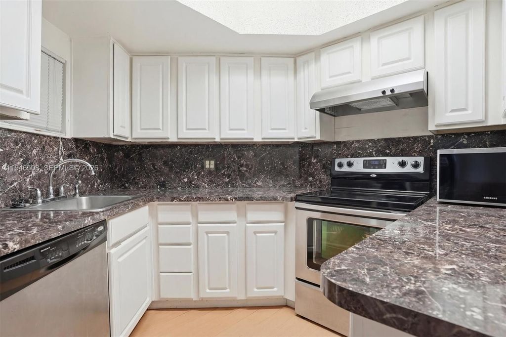 Photo of 8363 Lake Dr #503, Doral, FL 33166 (MLS # A11946508)