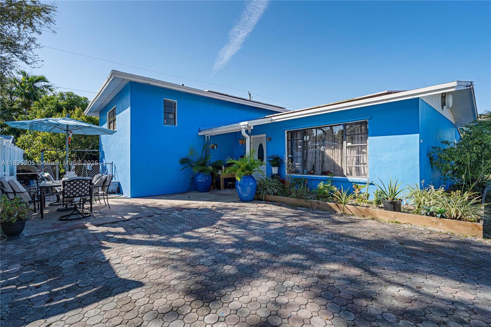 Welcome to this exceptional 4-bedroom, 2-bathroom home, plus an in-law suite, offering comfort and versatility in Ives Estates! Perfect for families and investors alike, this property features a brand-new roof (1 year old) and solar panels, providing significant energy savings and peace of mind. Set on an expansive lot, this home is ideal for outdoor living and entertaining, with a lush mango tree, a storage house, and parking for up to 10 vehicles, including space for an RV or boat—a rare find with no HOA. A versatile basement adds flexible living or extra storage options. Nestled in a quiet, family-friendly area, just a short drive from Aventura Mall, plus a variety of shopping, dining, and top-rated schools nearby. This unique opportunity won’t last—schedule your private showing today!