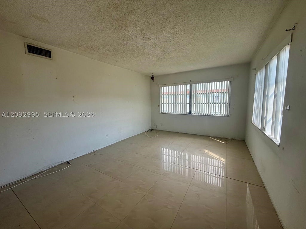 Photo of 1501 NW 43rd Ave #206, Lauderhill, FL 33313 (MLS # A12092995)