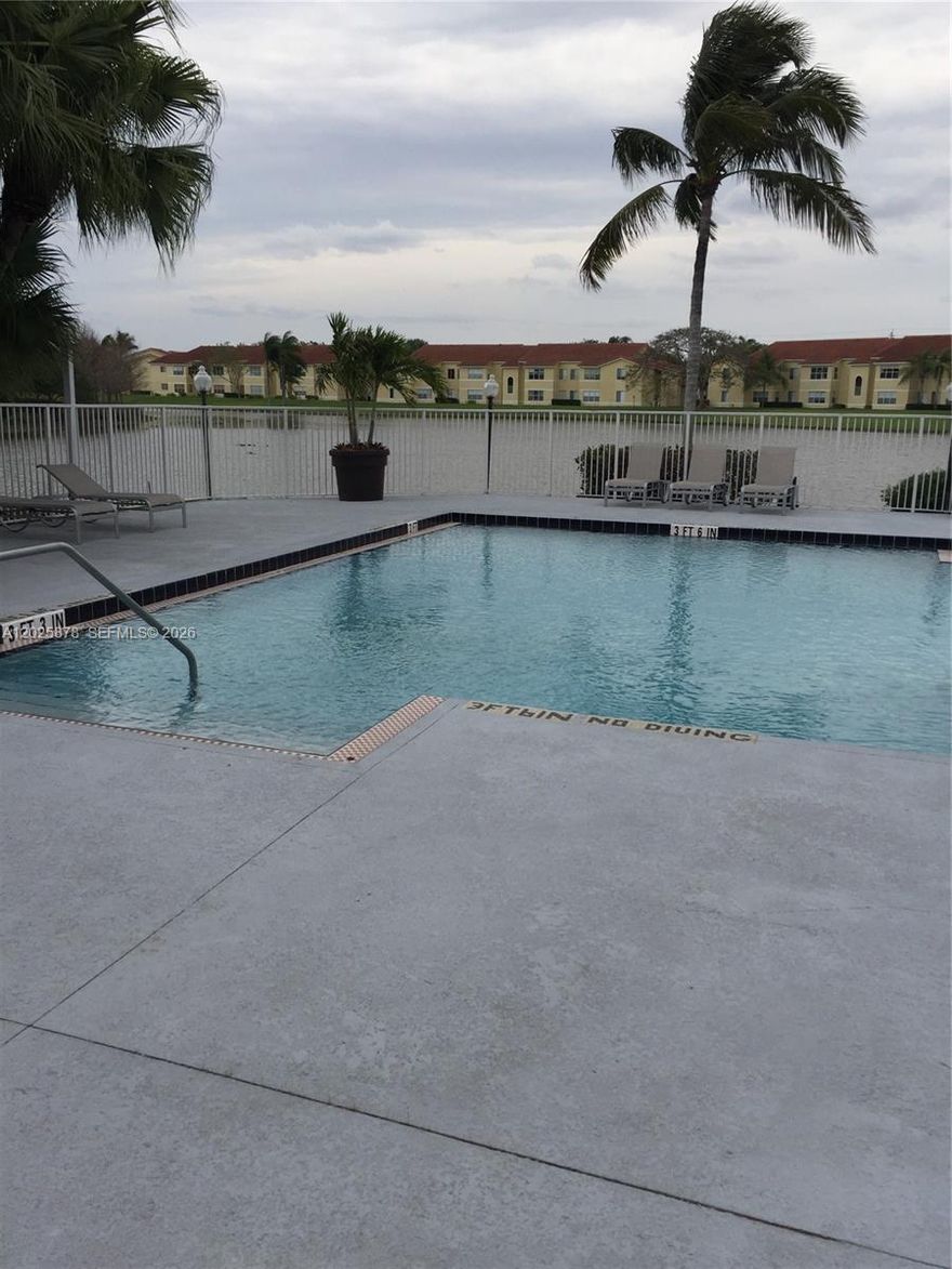 Welcome to Isles at Lagomar, a vibrant resort-style community in Sunrise one block from Sawgrass Mills Mall and near Bank Atlantic Center, restaurants and more. This spacious first floor unit features an open floor plan with impact windows and peaceful water and golf views. Two pools, outdoor BBQ and picnic areas, fitness center, racquetball court, lighted tennis courts, and scenic walking paths. Ample parking for residents and guests, A-rated schools nearby, and immediate access to I-75, I-595, and the Sawgrass Expressway.