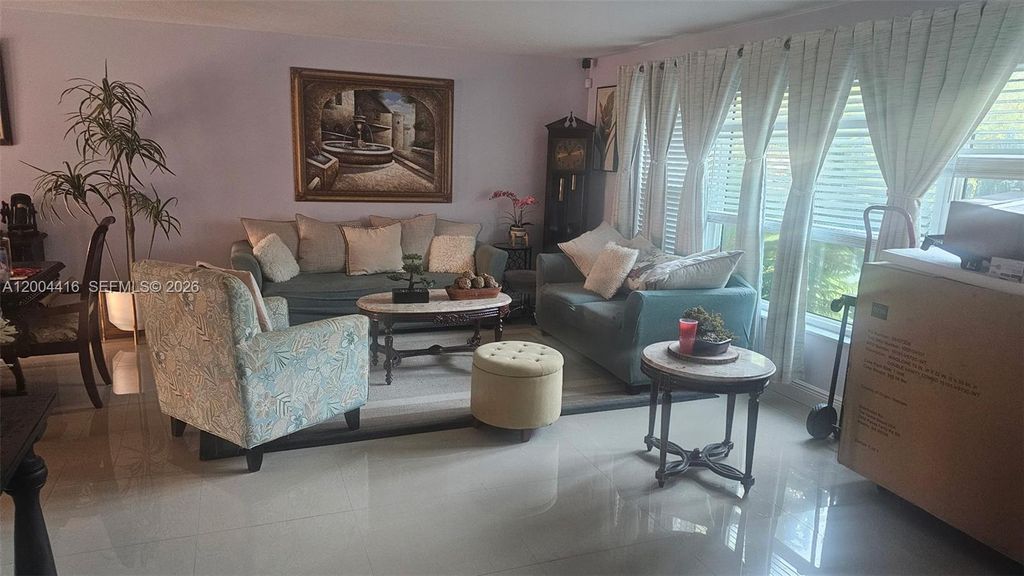 Photo of 4105 NW 78th Way, Coral Springs, FL 33065 (MLS # A12004416)