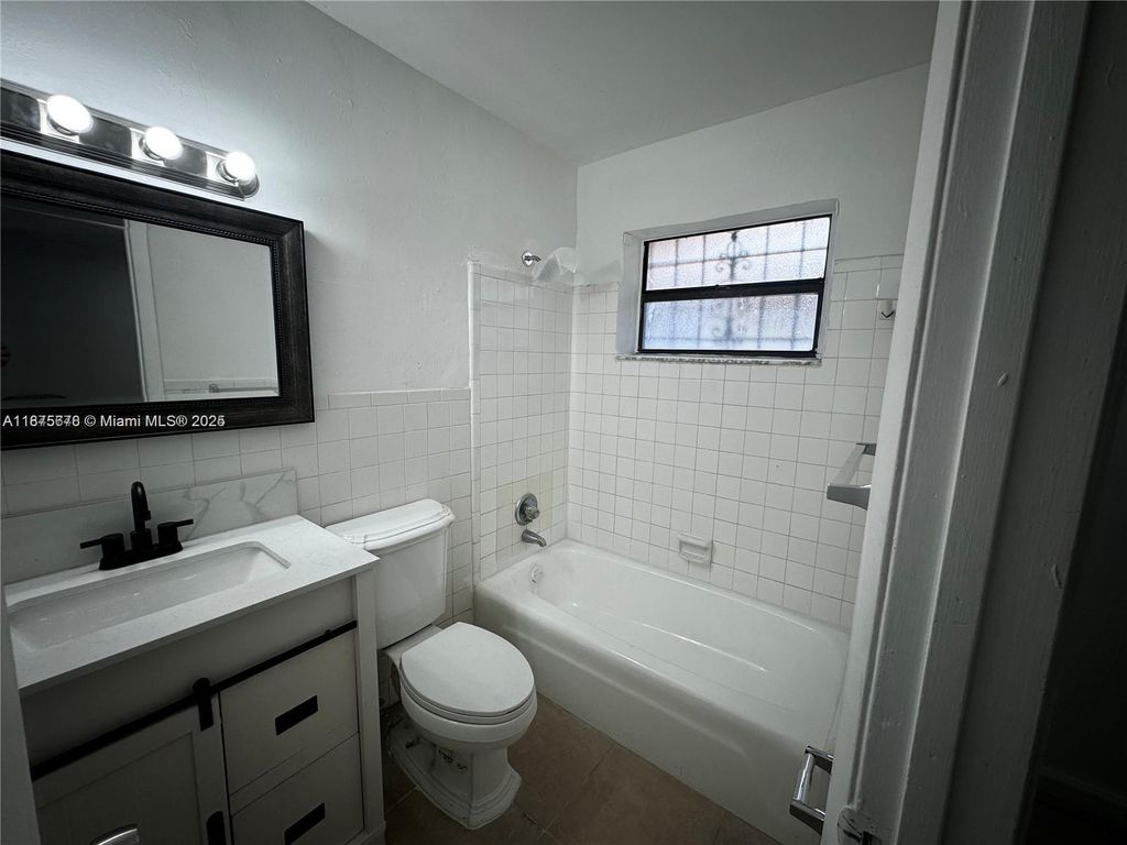 Photo of 2481 NW 13th Ct #1-2, Fort Lauderdale, FL 33311 (MLS # A11875678)