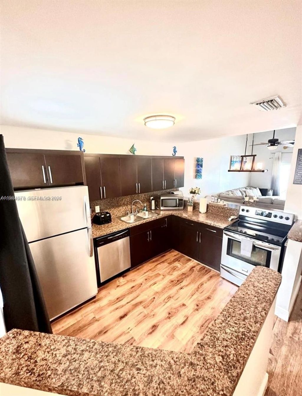 Photo of 2431 SW 58th Mnr #1-2, Dania Beach, FL 33312 (MLS # A11984078)