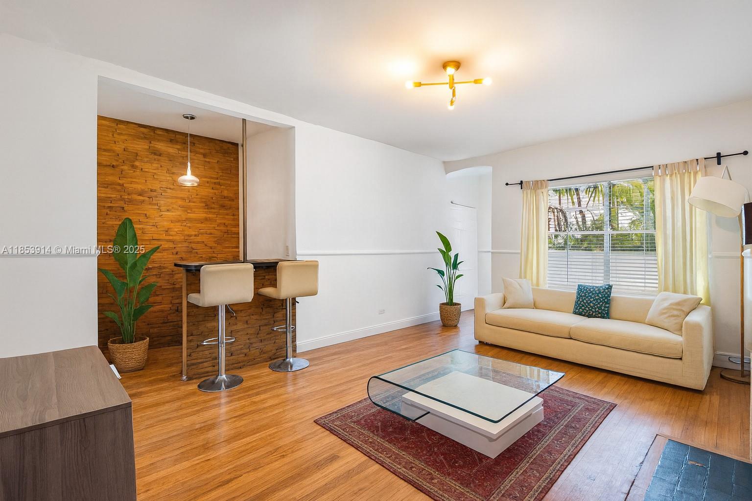 Tucked within an intimate beautifully landscaped Art Deco boutique building between Flamingo Park and Lincoln Road, This gorgeous and elegantly finished and furnished two-bedroom has it all. Draming original hardwood floors, high ceilings and a decorative fireplace. The renovated kitchen integrates stainless appliances and terrazzo countertops. Tall windows and ceiling fans enhance cross-ventilation in a layout thoughtfully designed for comfort and style. Residents enjoy a low-maintenance fee self-managed building with landscaped courtyard garden and on-site laundry. Just a block to shops, cafés, galleries and four blocks from the beach, this tranquil Miami Beach home reflects refined vintage elegance within walking distance to the beach, and Miami Beach best restaurants and the park.