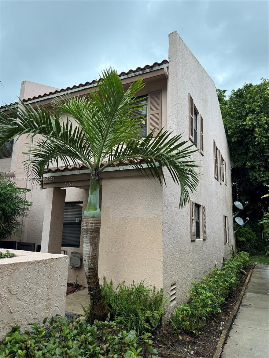 Spacious townhouse in Coral Springs. This corner unit offers the privacy and comfort of a home in a small, well-maintained community. Featuring 2 bedrooms and 2.5 bathrooms, each bedroom has its own private bath and walking closet. Enjoy the serene atmosphere of your private patio. The home features tiled flooring on the first floor and wood flooring in the bedrooms, complemented by impact windows and doors throughout, new AC unit. All ages are welcome, and small pets up to 25 lbs are allowed. Conveniently located near transportation hubs and a variety of restaurants. Don't miss out on this opportunity — perfect for homeowners or investors looking for a rental property. OK to lease