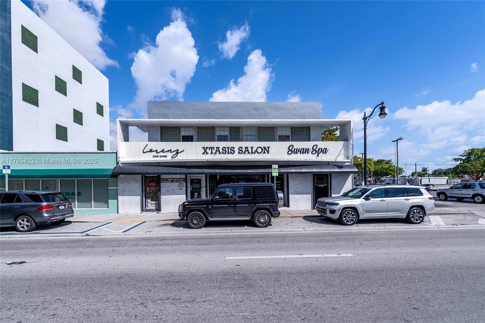 Rare investment opportunity in a high-demand commercial and residential area! Just reduced and priced to sell! This two-story building features three ground-floor commercial units and four second-floor residential units — all fully leased. Most units have been upgraded. The commercial units are equipped with brand-new accordion shutters and updated signage. The property includes seven dedicated parking spaces located behind the building. Brand new roof installation in progress.
With high visibility, strong foot traffic, and easy access, this is an ideal opportunity for investors seeking steady rental income and long-term growth. Surrounded by thriving businesses and a dense residential population.
Please do not disturb tenants. Showings by appointment only.