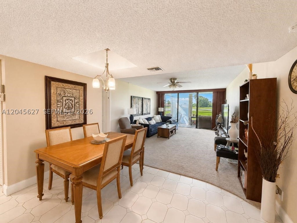 Photo of 16325 Golf Club Rd #111, Weston, FL 33326 (MLS # A12045627)