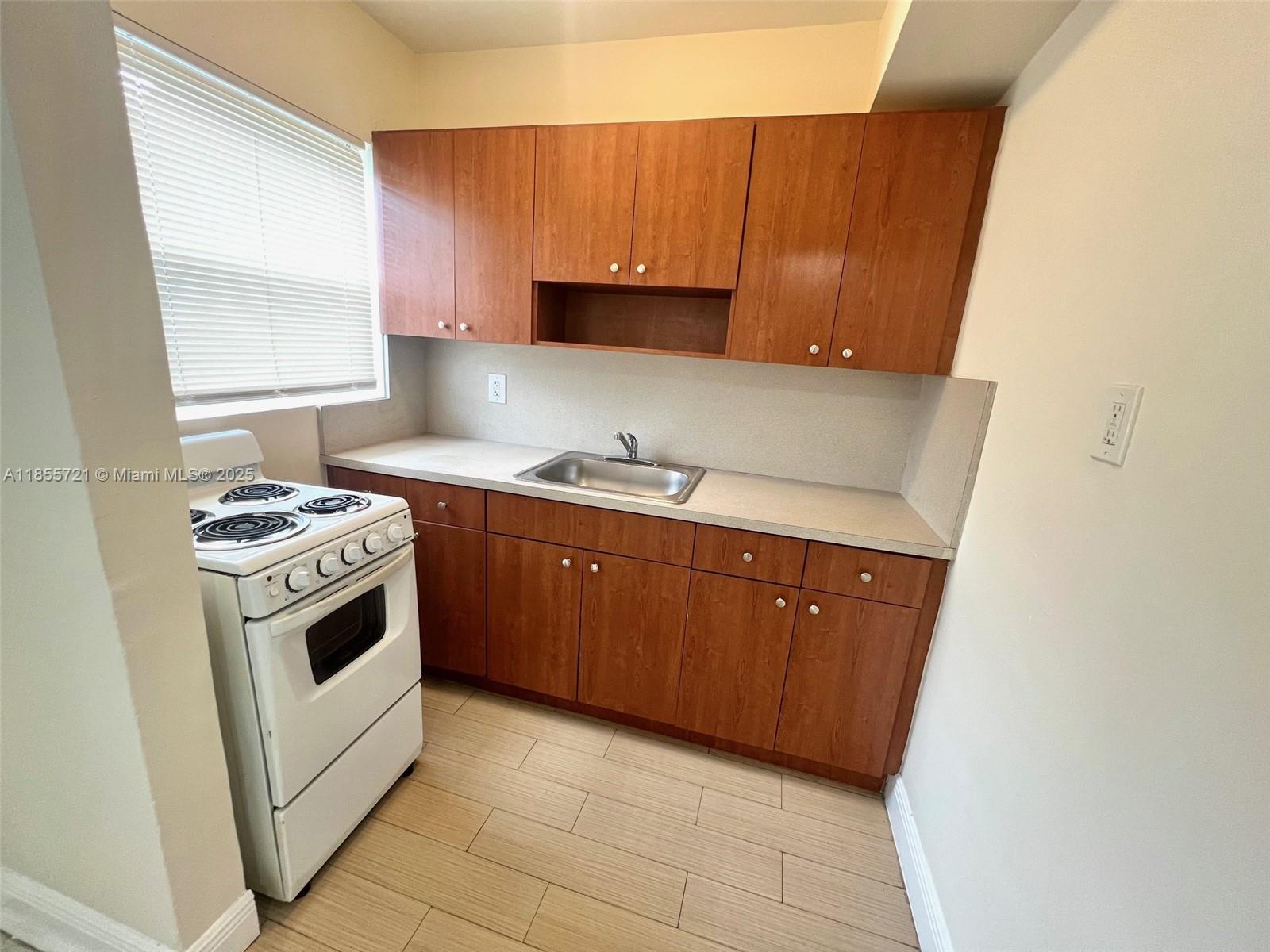 This well-maintained one-bedroom apartment features an airy, open-concept layout with a functional kitchen and comfortable living space. Ideally situated just minutes from Miami Beach and Downtown, with quick access to I-95, it offers the perfect balance of convenience and value in a prime location.