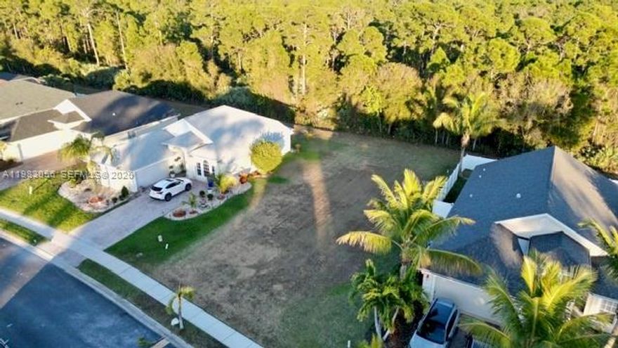 Vacant lot located in a small, desirable, tucked-away community where pride of ownership is evident throughout. This well-maintained neighborhood offers a peaceful setting and is pet-friendly, with the association caring for all common areas and irrigation. One of only two remaining vacant lots—an opportunity that is rarely available. Ideal for building your custom home in a quiet, established enclave. Sizes are approx/subj to error.