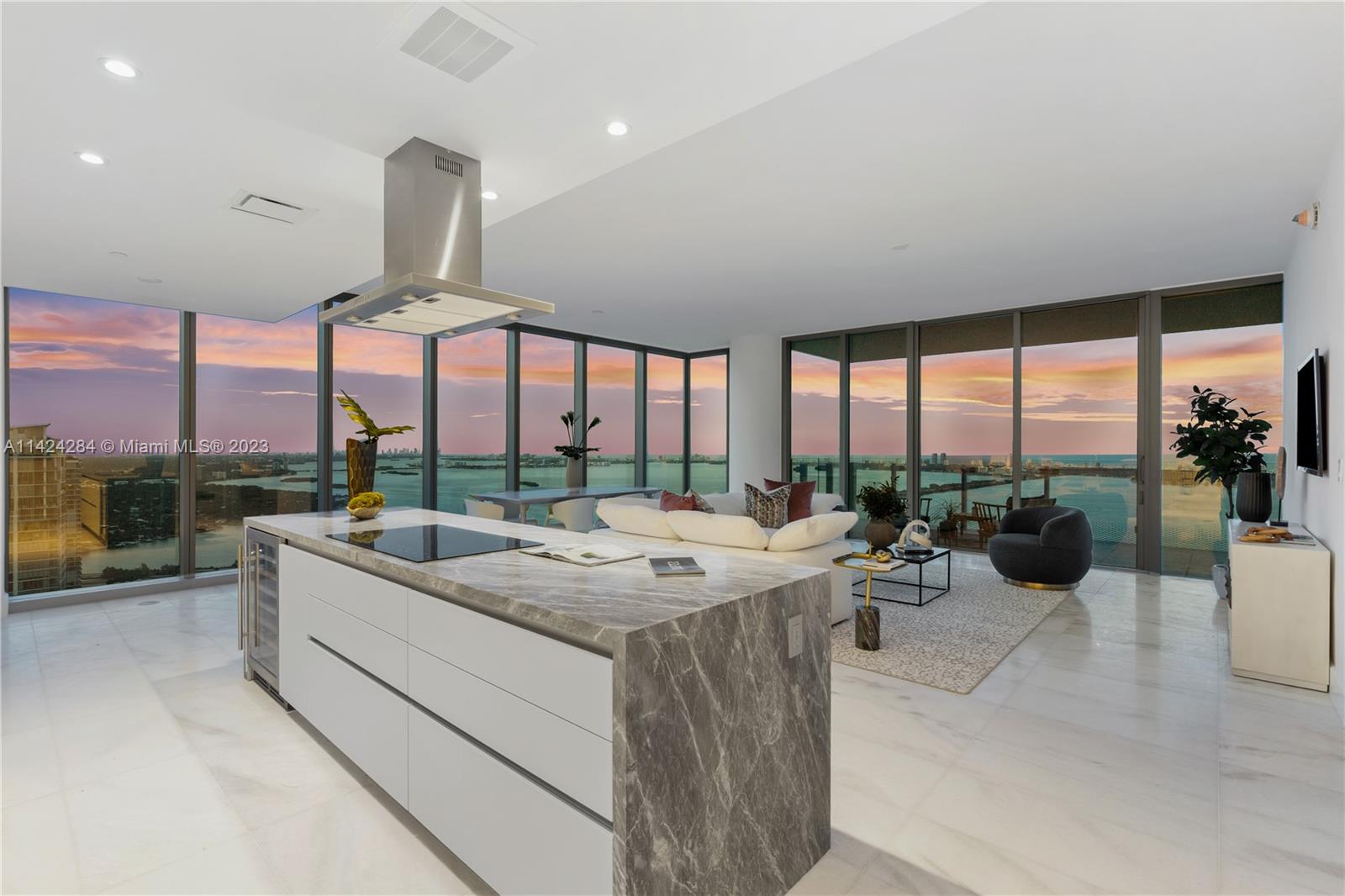Introducing this breathtaking brand new Missoni Residence in Miami's vibrant Edgewater neighborhood featuring 3-bed, 4.5-bath + bonus den which can also be used as small 4th bed w en suite. Enjoy stunning bay, skyline, and ocean views from the expansive balcony, complemented by 10'ft ceilings. The private elevator grants exclusive access to your home, featuring a grand foyer for a luxurious living experience. With a dedicated service area and private storage, convenience is unmatched. Spacious living areas, floor-to-ceiling windows, and elegant marble floors create a bright, inviting atmosphere. The gourmet kitchen boasts top-of-the-line appliances, Italkraft cabinetry, and wine cooler. Amenities include fitness center, three pools, saunas, tennis courts, BBQ area, pet spa, and playrooms.