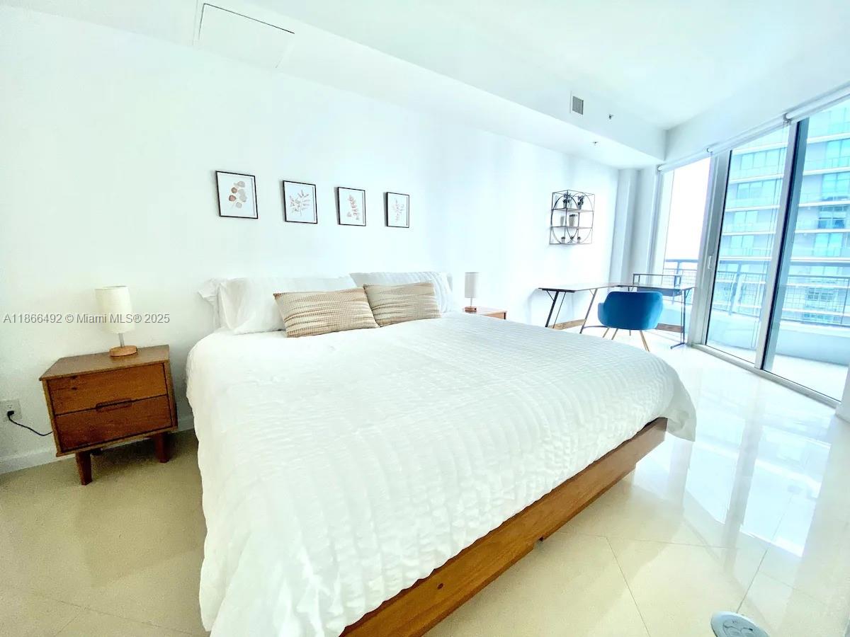 Perched on the 44th floor, this modern 1 bed / 1.5 bath Brickell condo spans 721 sqft and features 2 private balconies with sweeping city and water views. Residents enjoy exclusive access to the 50th floor sundeck with jacuzzi, wet kitchen, and sunbathing lounge. Recent upgrades include a new AC (2023) and electric blinds throughout. Leased Furnished at $3,500/month (Electricity Included), it offers both a luxury retreat and a solid investment. Deposits secured and transferable to buyer at closing. HOA includes water, internet, and cable.