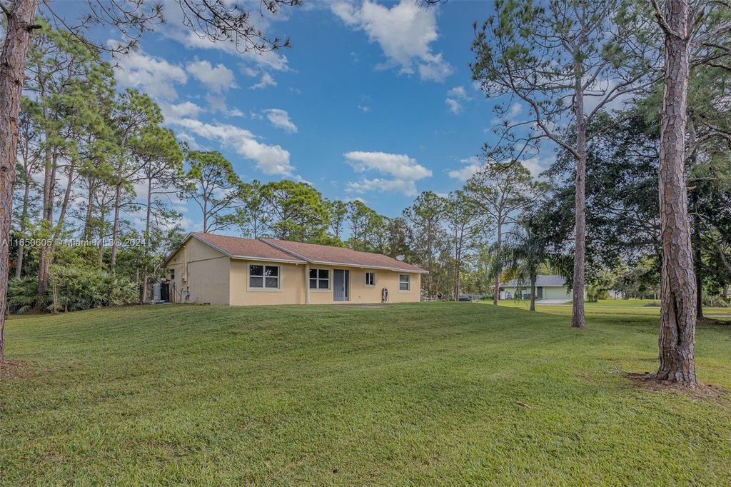 Photo of 17185 84th Ct North, Loxahatchee, FL 33470 (MLS # A11650605)