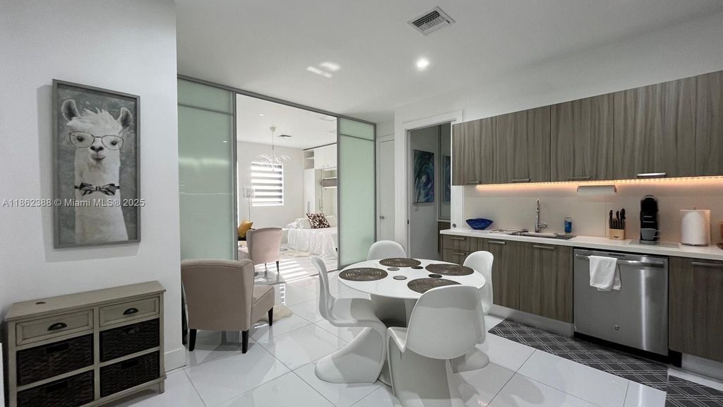 Photo of 1045 NE 18th Ave #401, Fort Lauderdale, FL 33304 (MLS # A11862388)