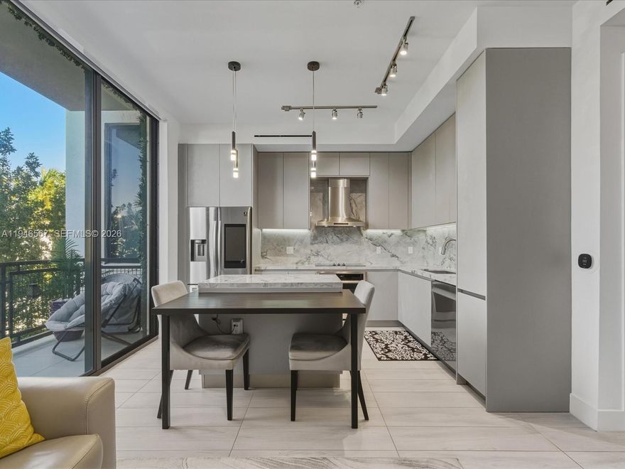 This boutique South Beach residence offers timeless design, flexible living, and lasting value in one of the area’s most sought-after locations.

Welcome to Ten30 South Beach, where modern design meets effortless Miami living. This bright and spacious 1-bedroom + den residence features soaring 10-foot ceilings, an open-concept layout, and abundant natural light that creates a calm, airy, and inviting atmosphere.

The sleek chef’s kitchen is thoughtfully designed with Italian cabinetry, quartzite countertops, and Samsung smart appliances, striking the perfect balance of style and functionality for both everyday living and entertaining. The primary bedroom is generously sized, offering space for a home office or reading nook, along with a large walk-in closet.

The den is a true standout and comfortably functions as a second bedroom, complete with its own walk-in closet, Murphy bed, and custom built-in storage, offering more storage than many two-bedroom units in the building, a rare feature in South Beach.

Ten30 delivers boutique, resort-style amenities including a rooftop pool and BBQ area, Pilates studio with reformers, cardio equipment, secured garage, and assigned parking. Located just one block from Lincoln Road and under a 10-minute walk to the ocean, this residence offers the perfect balance of vibrant city living and everyday comfort.

This is a home that delivers on design, livability, and long-term value. Opportunities like this rarely last.