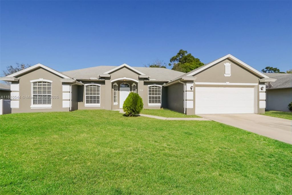 Photo of 1916 SW Glenco St, Port Saint Lucie, FL 34953 (MLS # A11810544)