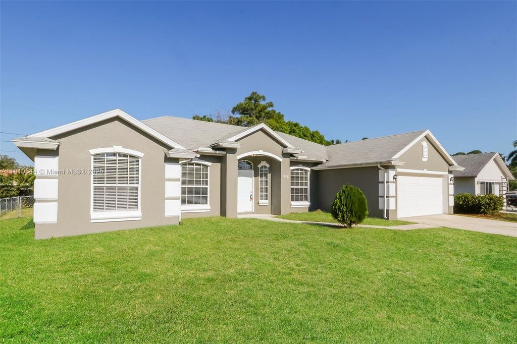 Photo of 1916 SW Glenco St, Port Saint Lucie, FL 34953 (MLS # A11810544)