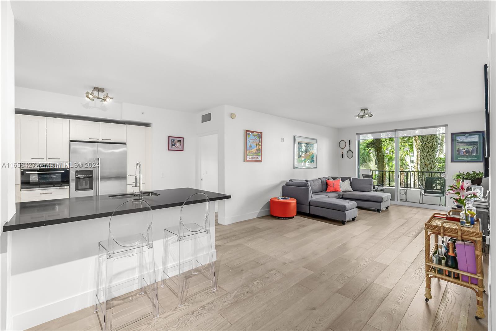 Step into this beautifully renovated (in 2017) condo at Lauderdale One. This delightful residence features 2 beds/2 baths and a balcony that overlooks a quaint inner courtyard. Impact windows create light filled living spaces. Laminate wood floors throughout and an open concept forms a warm atmosphere for easy entertaining. The kitchen offers silestone countertops and stainless steel appliances. Full washer and dryer completes this amazing condo. Experience all Lauderdale One has to offer with a heated pool, hot tub, business center, newly equipped fitness center and a billiard room perfect for hosting fun time w/friends! Conveniently located close to popular beaches and all that Ft Lauderdale’s vibrant city has to offer. Don’t miss out on this opportunity! Schedule a showing today.