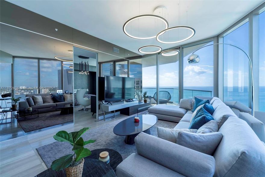 Live the Armani dream at this oceanfront masterpiece in Sunny Isles Beach, Florida. Exquisite 2-bed + den apartment stuns with panoramic ocean & city views through 10-foot ceilings & expansive windows. Step into a haven of exquisite, elegantly designed units, with top-of-the-line appliances & gleaming stone countertops. Dive into endless world-class amenities: private oceanfront dining, serene Armani Spa, movie theater, cigar rooms, playful children's zone, & state-of-the-art fitness center with direct beach access. Own a piece of the Armani legacy & experience luxury reimagined. The property is fully furnished and includes all decorations in the price. Maintenance fee includes valet, basic internet and cable, and water. Ready to move in! Contact me today for your private viewing.