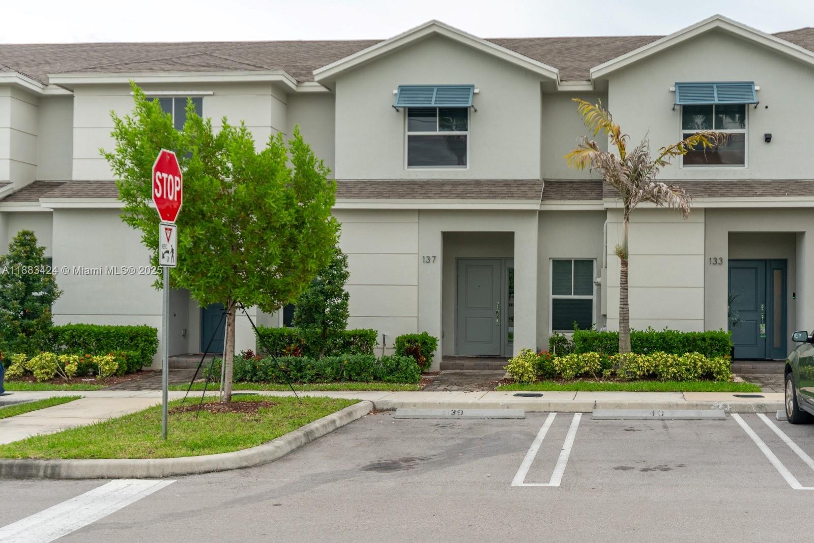 Discover this stunning 3-bedroom, 3-bathroom residence located in the peaceful Sebastian Place community. Built in 2023, one one-bedroom and bathroom on the first floor. This property combines contemporary design, comfort, and energy efficiency, making it the perfect place to call home. Spacious living and dining area with excellent natural lighting.Master bedroom with private bathroom and large closet.Ceramic tile flooring in living areas and soft carpet in bedrooms. Washer and dryer inside the unit.Fenced backyard, perfect for outdoor relaxation or BBQs.Private parking for two vehicles right in front of the property.