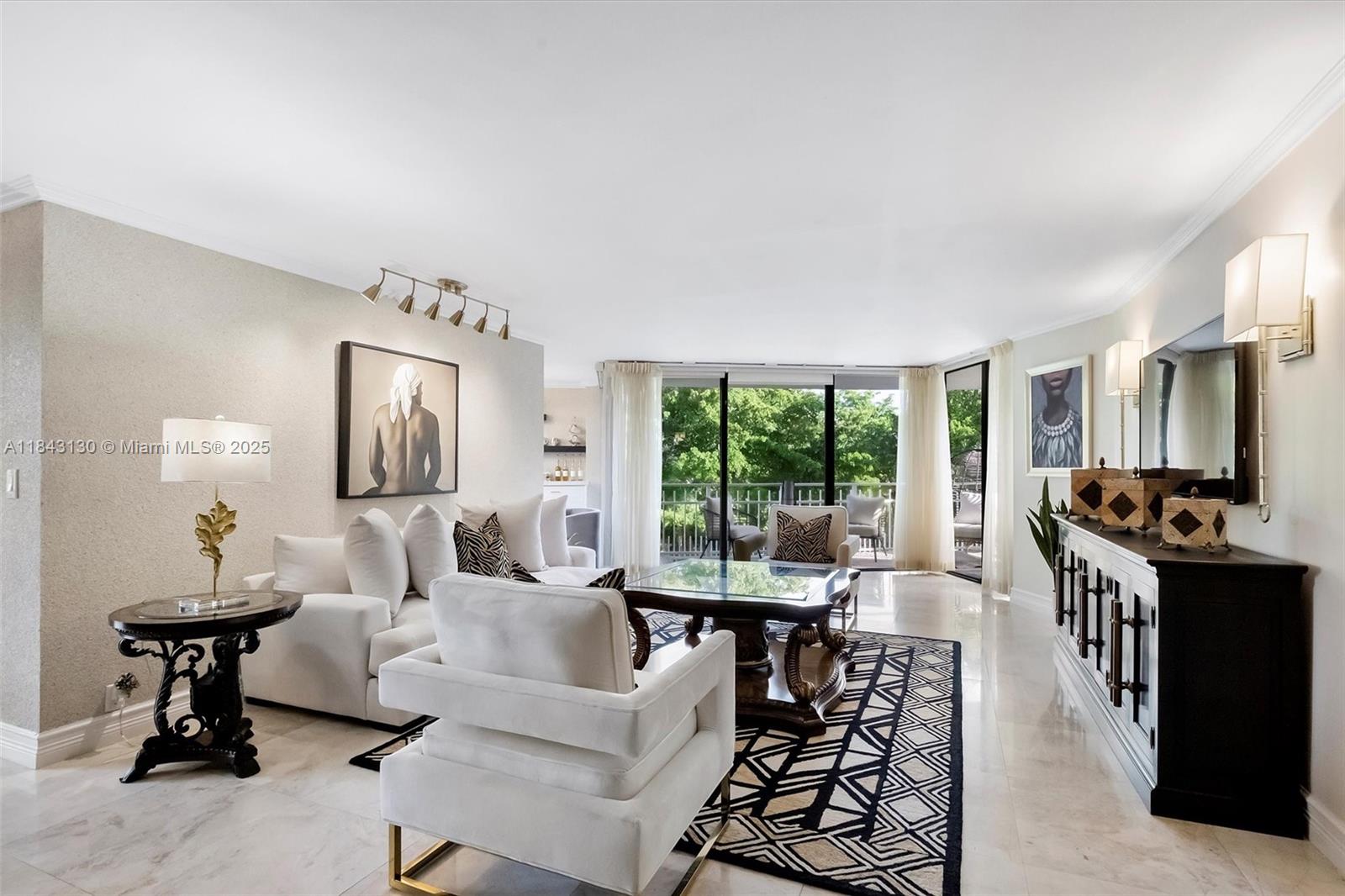 Renovated 2 bed condo at Quayside, tranquil garden views. This spacious unit features large primary suite, modern bath, open kitchen, dining room, breakfast nook, stainless steel appliances, custom walk-in closet, generous wraparound balcony. 1 assigned parking space, valet, a private storage unit. Complex offers gated, secured resort-style living in the heart of Miami with lush landscaping, scenic ponds, marina, and walking paths. Amenities include a full-service gym/spa, indoor lap pool, outdoor pools, BBQ areas, bike storage, clubhouse, free shuttle, tennis complex for enthusiasts, Pickleball, racquetball, basketball court, playground, dog park, an on-site restaurant & bar, happy hours, and community events. 40-year recertification completed. Assessments monthly $250.57 & $150.94.