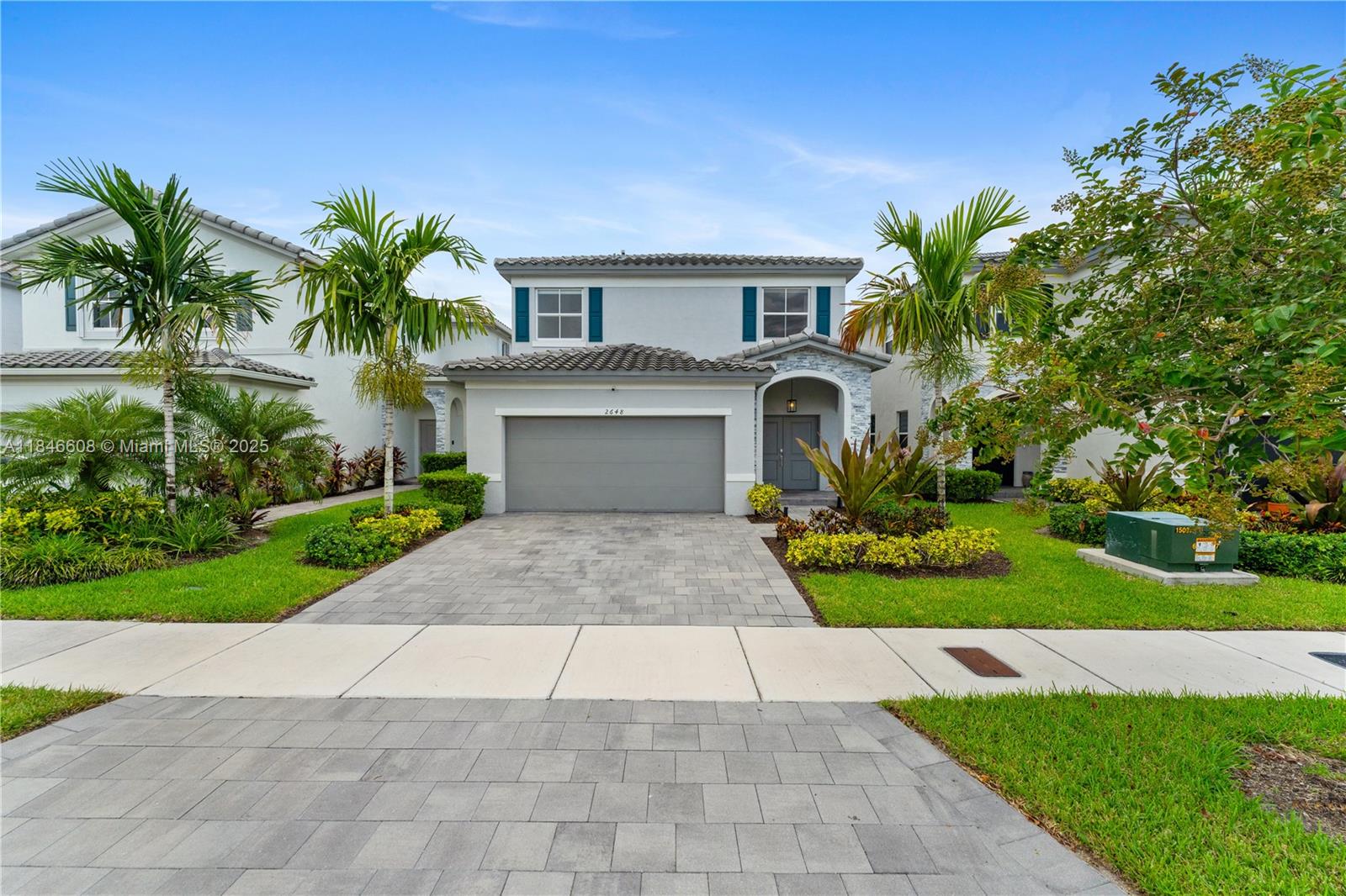 Beautiful two-story home in the sought-after Keys Gate community with stunning lake views. Features bright, open living spaces and a modern kitchen with quartz waterfall countertops, full appliances, and classic wood cabinetry. One bedroom is conveniently located downstairs, while the remaining bedrooms, including a spacious primary suite with a glass-enclosed shower and walk-in closet, are upstairs. Enjoy a peaceful backyard with tranquil lakefront views. Community offers 24/7 security, clubhouse, pool, tennis courts, and more. Near top-rated schools, shopping, dining, and the Florida Turnpike. Schedule your showing today!