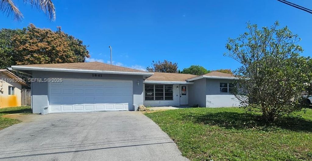 Photo of 1641 NW 45th St, Oakland Park, FL 33309 (MLS # A11983091)