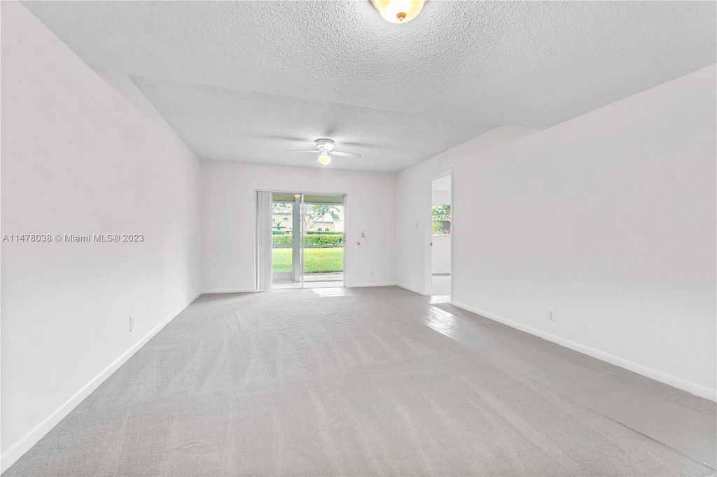 Photo of 18081 SE Country Club Dr #Bldg 1 Apt 5, Jupiter, FL 33469 (MLS # A11478038)