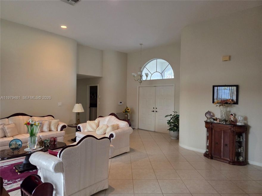 Room to live, work, and entertain in this spacious 5-bedroom, 3-bathroom home. Opportunity awaits in the highly desirable Silver Lakes community of Pembroke Pines. This spacious 5-bedroom, 3-bathroom single-family home offers soaring volume ceilings and a desirable split-bedroom floor plan, creating an excellent canvas for buyers ready to update and design the home to their own taste. The generous living areas provide great space for reimagining the layout and finishes, while the five bedrooms offer flexibility for family, guests, or home office needs. With solid bones, a garage, and a prime location within one of Pembroke Pines’ most sought-after communities, this home presents a fantastic opportunity for buyers looking to add their personal touch and create their dream home. Conveniently located near parks, shopping, dining, and major roadways.