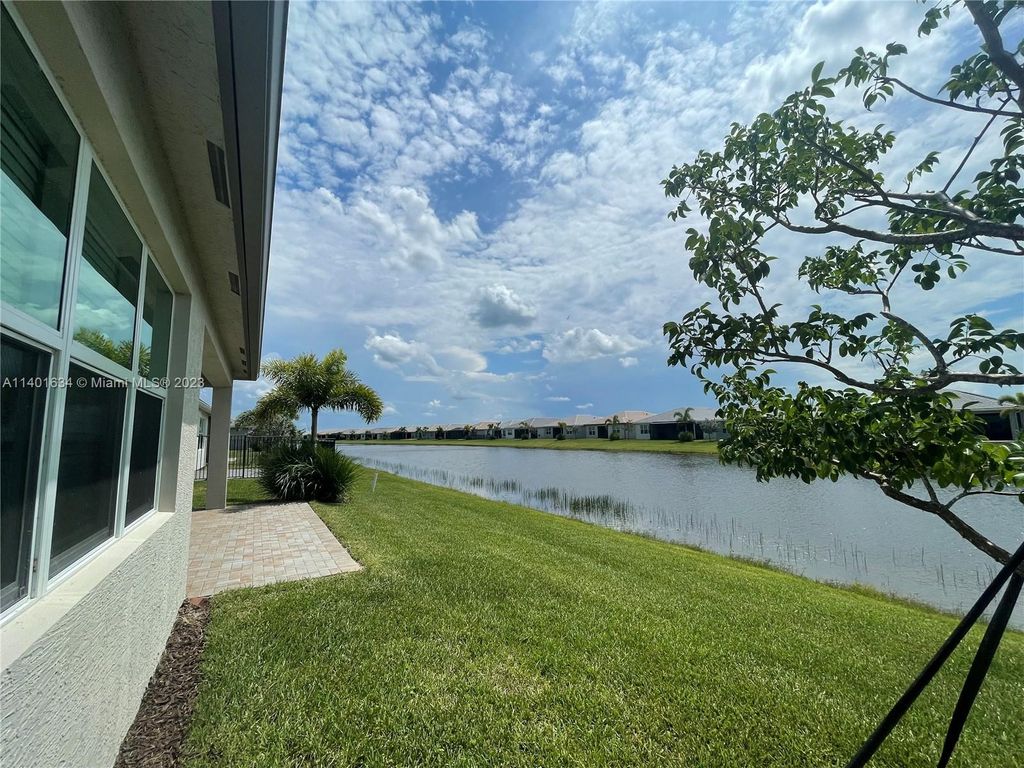 Photo of 11626 SW Moon River Way, Port Saint Lucie, FL 34987 (MLS # A11401634)