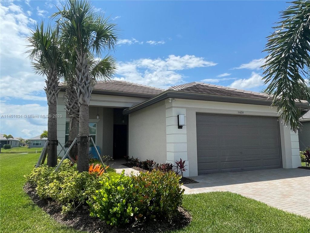 Photo of 11626 SW Moon River Way, Port Saint Lucie, FL 34987 (MLS # A11401634)