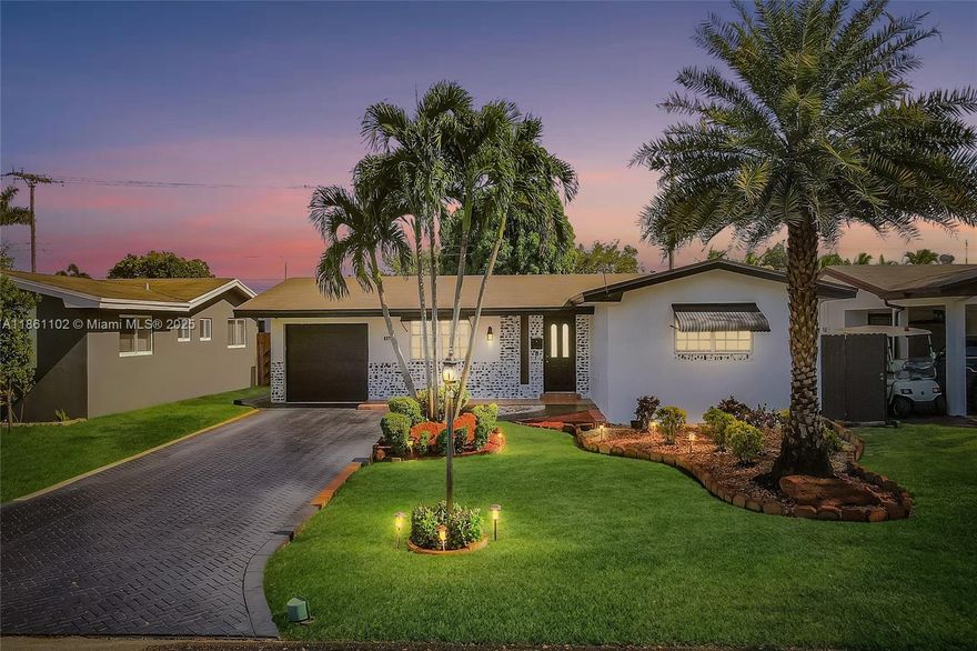 You will fall in love with this home as soon as you admire the curb appeal up close! 2 BR, 2 bath home features a freshly painted exterior & sealed stamped concrete black driveway with room for 5 cars, boat, or RV, plus a 1-car garage. Renovations include roof, AC, & electric all updated since 2016! Beautiful landscaping with palm trees in the front yard creates a warm, tropical feel. Inside offers a spacious free-flowing open layout with living, dining, and Florida room, updated baths, & a cozy eat-in kitchen with new appliances including refrigerator, washer, & dryer. The covered, screened-in patio with Mexican tile can also be transformed into a party room or potential third bedroom. Newly fenced 7-foot yard with space for a pool. Excellent location close to parks, shopping, and malls.