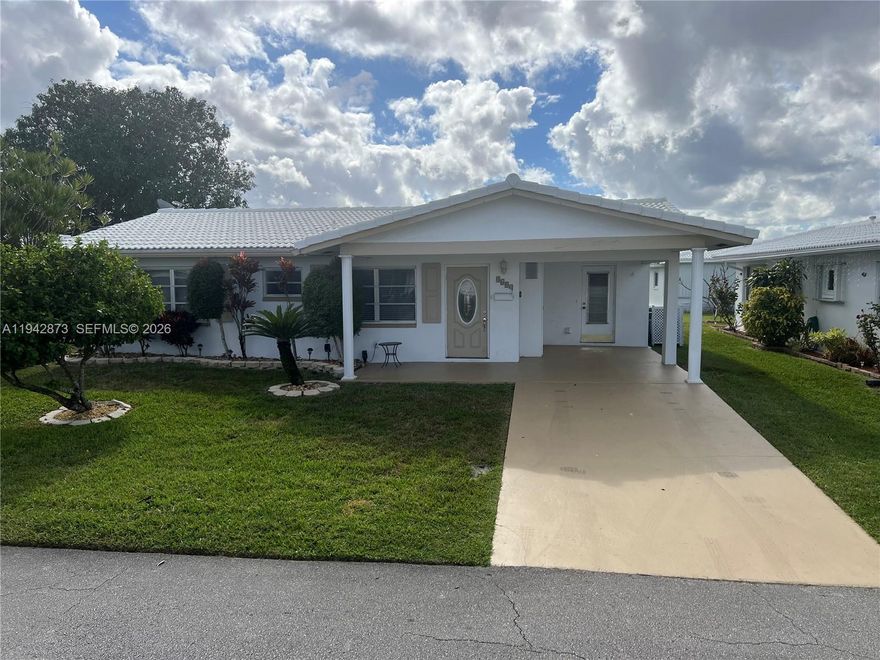 Welcome to easy carefree living in this gem located in a desirable 55+ community in The Mainland's, this sprawling home offers l 2BED/2BATH with almost 1400 sq. ft of living area that offers so much!... 2 split bedrooms, each with generously size closets. The versatile floorplan features: formal living room, dining area, laundry room and huge family/Florida room. Enjoy a peaceful neighborhood atmosphere along with access to community amenities and social activities ideal for enjoying a relaxed and active lifestyle This home is located near all major shopping, dining, sports venues and conveniently located near the Sawgrass expressway & 595, 20 mins from downtown & Ft. Lauderdale airport. ** A MUST SEE *