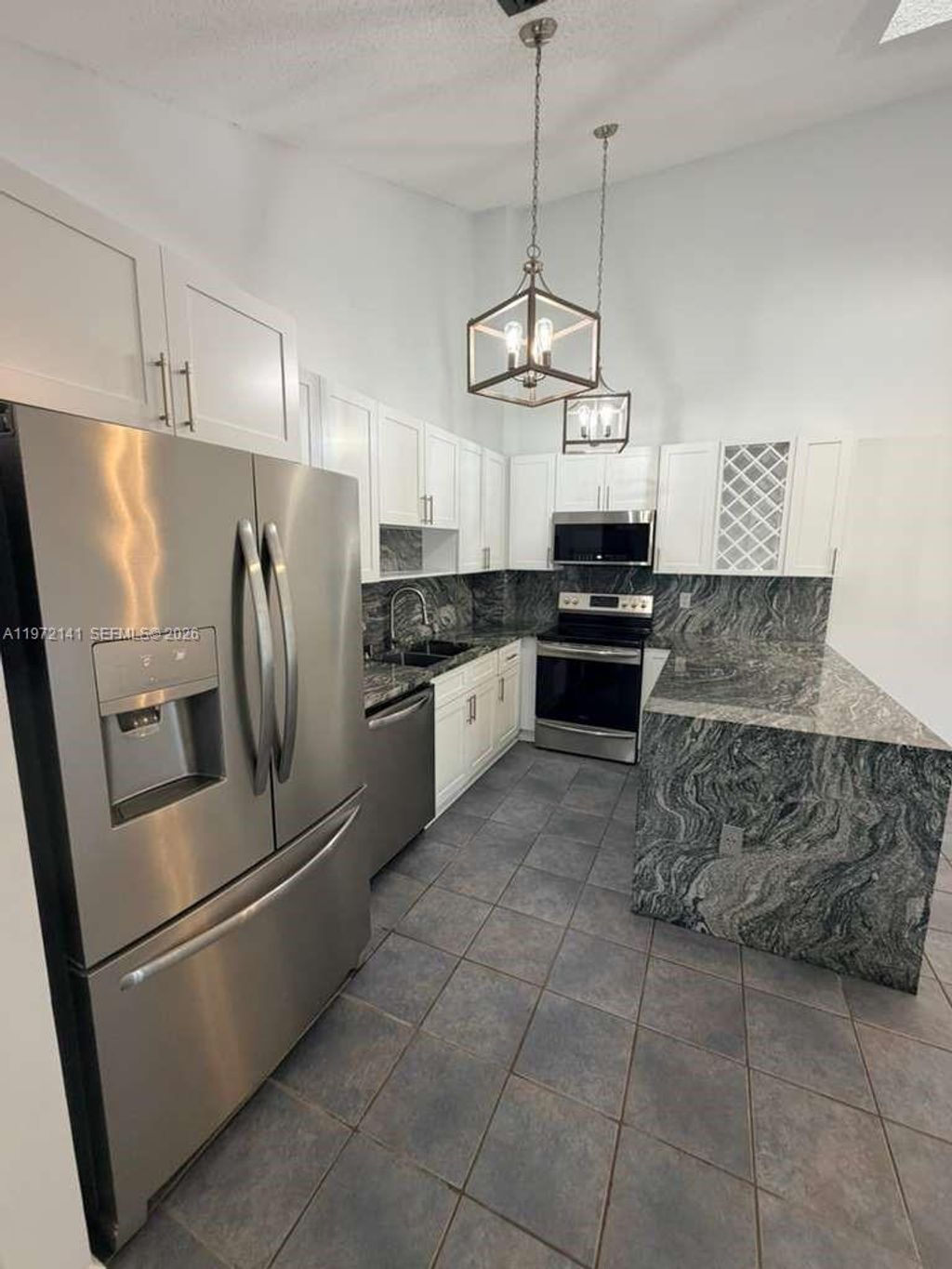 Photo of 1350 Periwinkle Pl, Wellington, FL 33414 (MLS # A11972141)