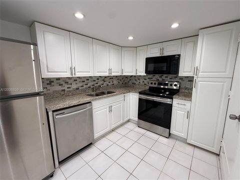 Photo of 400 Kings Point Dr #608, Sunny Isles Beach, FL 33160 (MLS # A12006859)