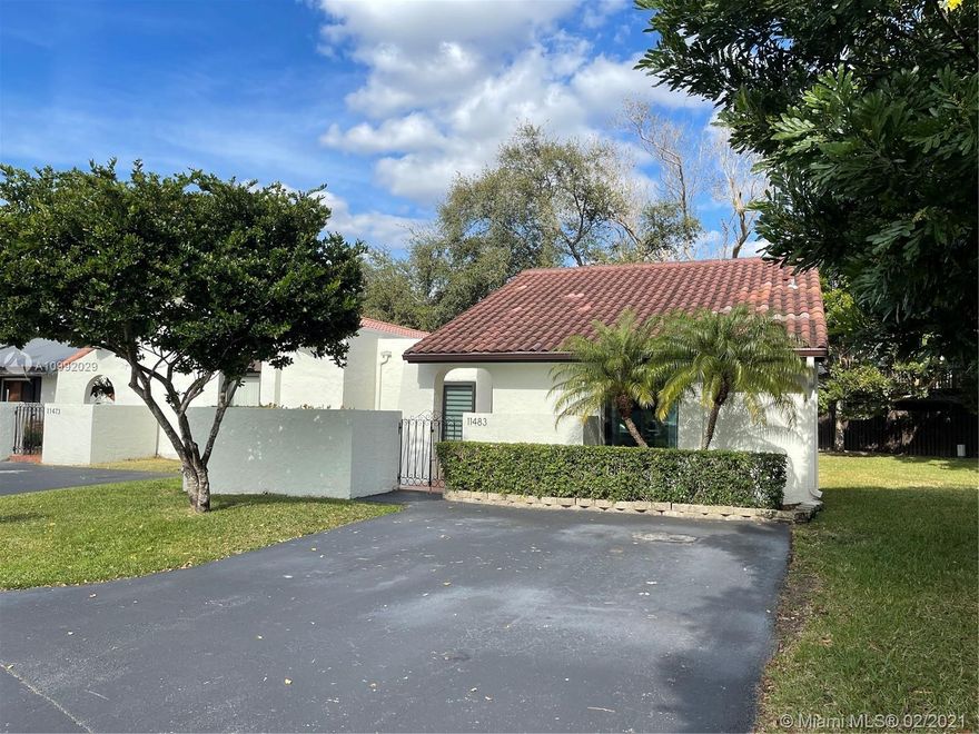 Simply amazing corner townhouse! Beautifully updated throughout down to the smallest details, such as baseboards and finishes. New AC, new recessed lighting, new tankless water heater, new interior doors, new gutters, and full impact windows and doors make this the perfect move-in ready home. Home has a gated, front courtyard and rear patio providing plenty of outdoor space. Generous sized driveway and plenty of guest spots right across from the unit provide for ample parking. Very low HOA. This is one not to miss!