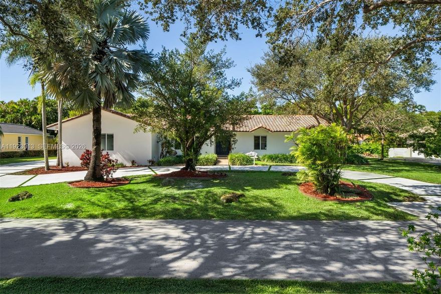 Nestled in the prestigious guard-gated community of Pinecrest by the Sea, this exceptional 5bd 3ba residence offers 3626 adj sf on an elevated 15,376 sf lot ideally located in the A-rated Pinecrest School District & top-tier private schools. This 1-story home offers 3099 sf of AC light-filled liv areas featuring a split floor plan for seamless flow & privacy. Originally built in 1976 with numerous updates including a 2023 kitchen boasting modern cabinetry & breakfast bar opening to expansive family room seamlessly leading to spacious covered veranda, sparking pool/patio which is thoughtfully screened-in for year round enjoyment. The primary suite is a private retreat w/dual walk-in closets & spa-like bth w/separate tub/shower & dual sinks, while 4 additional bdrms strategically situated for family & guests including a cabana bth. Highlights include 2015 new barrel tile roof, 2020 new impact windows/doors throughout & 2026 new concrete paver driveway, 2-zone AC & side-entry 2-car gar w/split unit AC & 2025 new impact-rated door. This tropical oasis located in the community of Pinecrest by the Sea is on a low-traffic, peaceful interior tree-lined street featuring a brand-new circular concrete paver driveway w/ample space for boat or RV.  Well located near parks, tennis clubs, Pinecrest Gardens & Community Cntr, Matheson Hammock Marina, Fairchild Gardens, Deering Bay Yacht/Golf. A neighborhood park right inside the gated community features playground, field, basketball & gazebo.